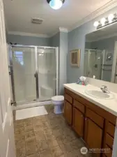 The main bathroom comes with a walk in shower area!