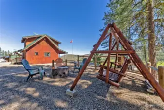 Fun firepit area near cabin has had years of roasted marsh-mellows, tall tales and laughter.