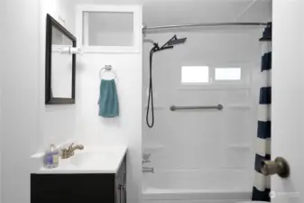 Full Size Bathroom Located In Hallway