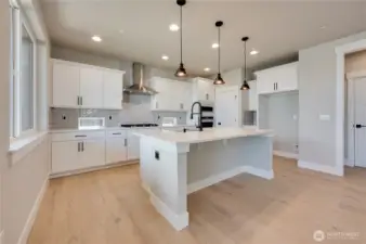 Plan 2665 Elevation B - photos taken of another home. Colors & Finishes will vary.  No two homes are exactly alike. Ask for details.