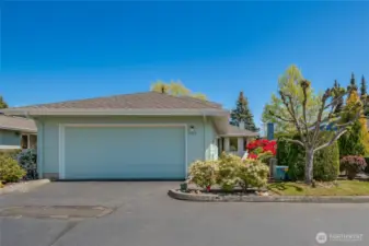 Large. attached garage, private walkway to entry