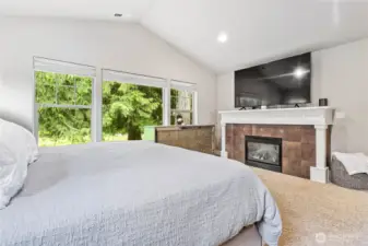 Gas fireplace in main bedroom overlooking the fairway.