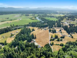 Stunning elevated view over the estate with sweeping countryside and Cascade mountain backdrop.