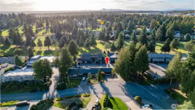 Red arrow is unit #1.  Skagit Golf & Country Club golf course is just beyond the condos.  Memberships available.