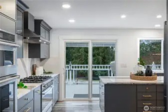 Kitchen view with additional access to wrap around deck.