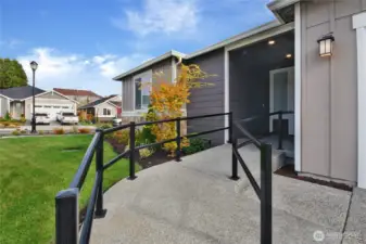 No stairs/steps leading to the front porch.