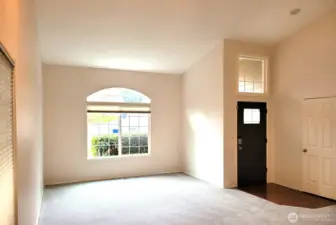 Large, Bright Living Room with Vaulted Ceilings, Fresh Paint and Carpet