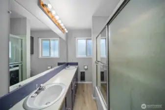 Bathroom with full tub & shower.