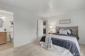 Primary bedroom with attached 3/4 bath.