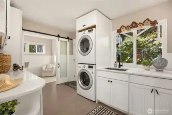 Laundry room with office in the background