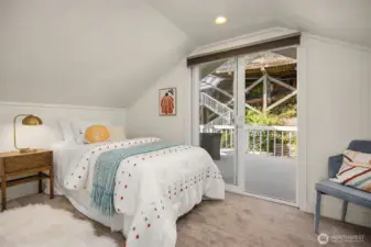 Uptairs, back bedroom with deck.