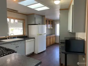 Additional view of the kitchen.