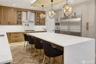 seats on both sides of breakfast bar