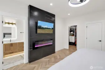 Primary bedroom with walk in closet and bathroom