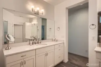 Two separate vanity areas with separate sinks