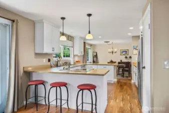 Kitchen eating bar adds another layer of convenience.