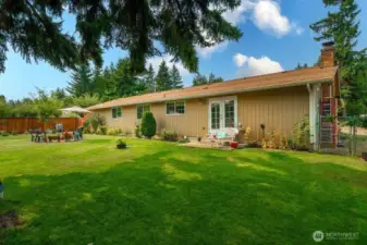 You will love this serene back yard.  Plenty of room for all the fun or just sit back and enjoy the quiet.