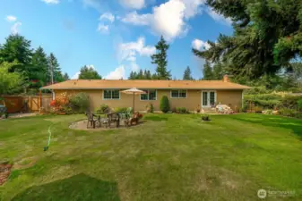 Back yard is fenced and gated and offers a great place to unwind after a long day.