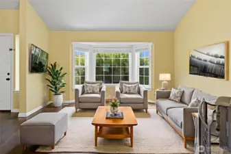 The formal living room is the place to host guests and also lets you step away from the bustle of the kitchen and Great Room area. This home is virtually staged.