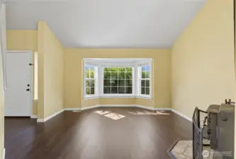 The formal living room is the place to host guests and also lets you step away from the bustle of the kitchen and Great Room area.