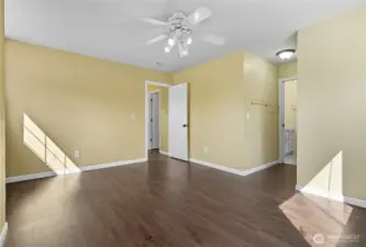 The large primary bedroom features an attached bathroom and walk in closet.