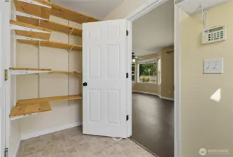 Generous storage in the utility room that connects to the garage for easy access.
