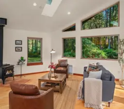 This great room enjoys so much light with banks of big windows and multiple skylights. This one-owner home was thoughtfully designed and lovingly built.