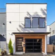 Easy entry on alley side, with garage plus 1 parking space in front of garage