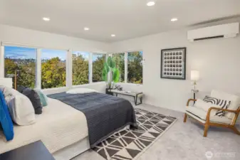 Primary bedroom with sweeping views