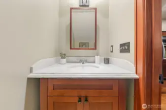 Main level half bathroom.