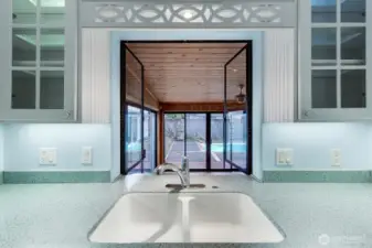 Double windows open out to the sun room