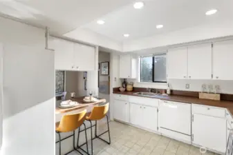 This bar seating provides a gathering spot and facilitates conversation, interaction and a social hub in the kitchen.