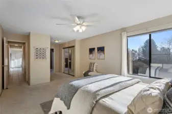 This primary bedroom must-haves include the sizeable walk-through closet and en suite bathroom. Bonus - it also has the added luxury of abundant natural light and landscape views.