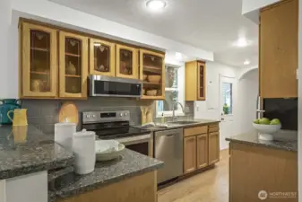 Charming and Victorian inspired kitchen that tastefully compliments the exterior of home.