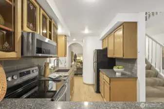 Quartz countertops, newer backsplash and ss appliances.