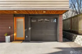 Complete with a extra deep garage and a fully-fenced-in backyard.