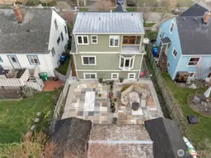 The patio, firepit and outbuildings from above.