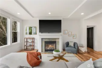 Tray and beam ceilings add archtictural detail and extra height to the rooms (Attached TV Does Not Convey)