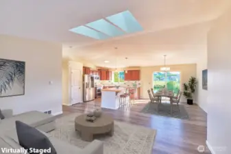 Dining area with slider to back deck and lake view