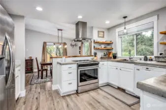 Lovely updated kitchen with cement countertops.