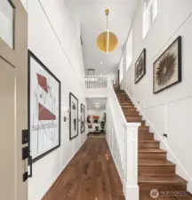 Dramatic two-story foyer. Photo of the Alabaster model home, includes upgrades & is not of actual home listed for sale.