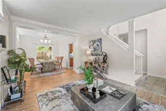 The entry living area seamlessly flows into the dining space