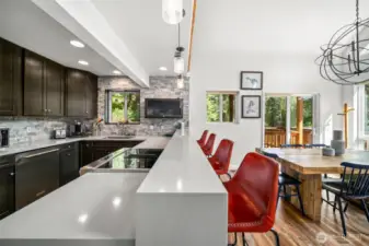 Chalet kitchen, bar, dining area.