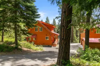 Yard with Chalet, ADU, and shed.