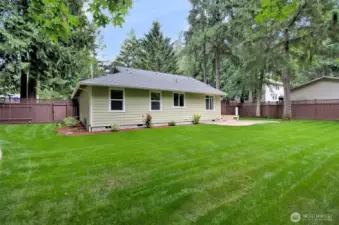 Beautiful landscaping and fully fenced back yard