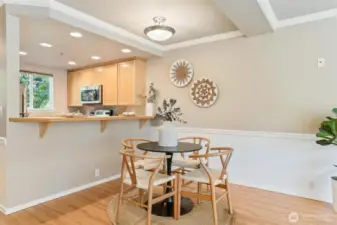 Stylish dining room accented by fresh finishes.