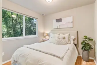 Comfortable lower-level suite with fresh finishes and its own ¾ bath.