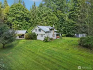 A wonderful setting with the nature's beauty....and well kept yard