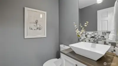 The main floor has a fully updated powder room just off of the family room.
