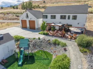 Outbuilding for yard equipment. Also houses a well pump that services the parcel across the street.